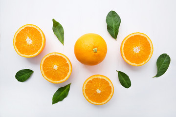 Fresh orange citrus fruit on wooden white background. Top view