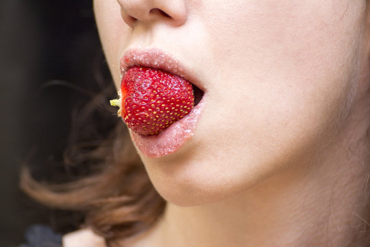 Strawberry lip scrub made at home to exfoliate lips 