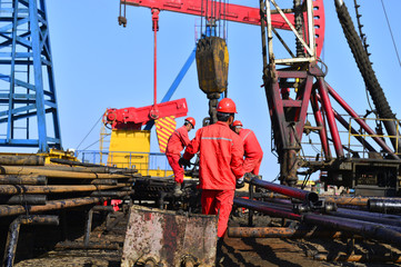 The oil workers in the job