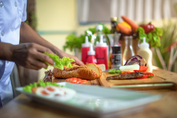 french burger prepare by chef in kitchen ready to serving in new and fresh
