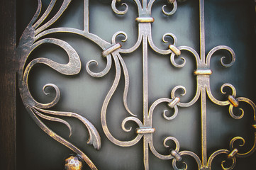 ornate wrought-iron elements of metal gate decoration