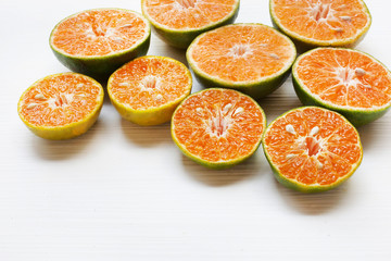 Naklejka na ściany i meble Orange fruit on white