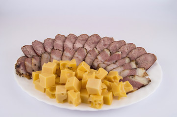 Bacon with sausage and hard cheese