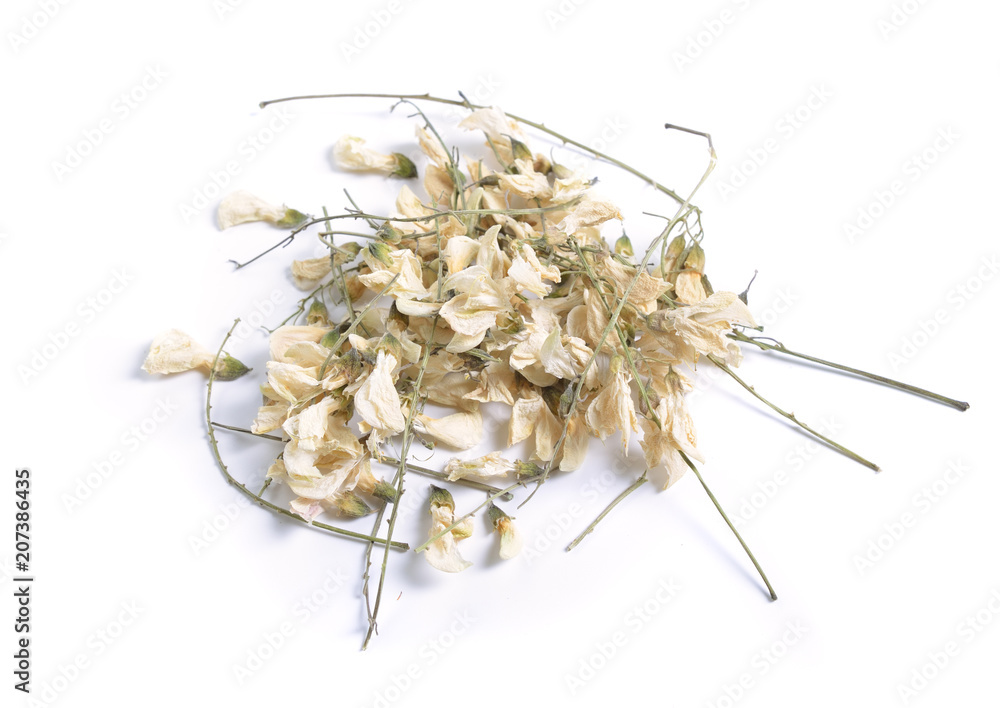 Wall mural dried medicinal herbs raw materials isolated on white. flowers robinia pseudoacacia