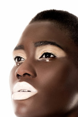close-up portrait of beautiful sensual african american woman with white lips looking away isolated on white