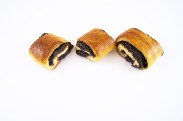 Buns with a poppy filling on a light background