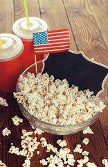 Salt popcorn on the wooden table