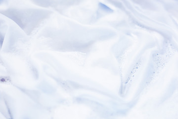 Soak a cloth before washing, white cloth