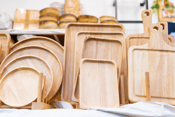 Fototapeta na wymiar Various of wooden utensils for sale in store