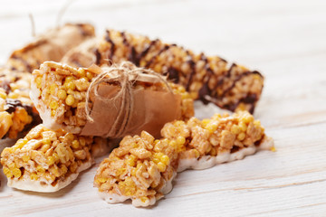 Granola bar on wooden background