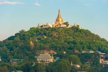 MANDALAY, MYANMAR - DECEMBER 1, 2016: Golden Pagoda in Sagaing hill, Burma. Copy space for text.