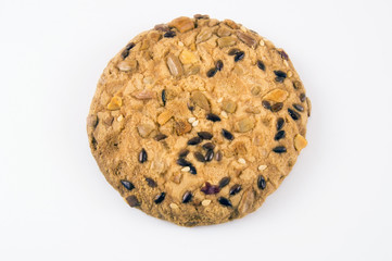 a large shortbread cookie sprinkled with seeds