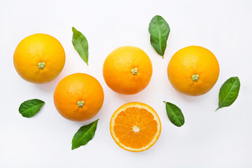 Fresh orange citrus fruit on white background.