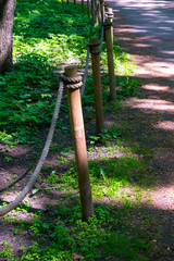 Fototapeta premium fence of the rope in the park