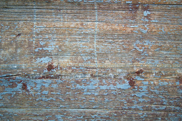 Blue background of weathered painted boards