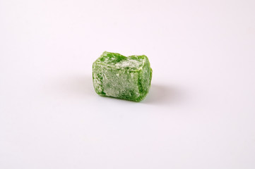 Turkish sweetness of lukum green on a light background