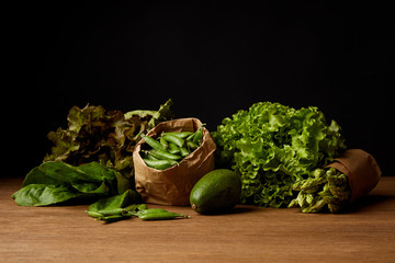 close-up shot of ripe green vegetables on wooden surface
