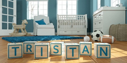The name tristan written with wooden toy cubes in children's room