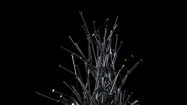Metal nails under the influence of a magnetic field. Abstract background.
