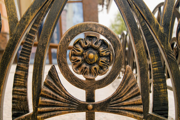 Beautiful forged elements decorating low fencing