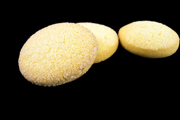 Cookies of corn flour on a dark background