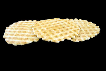 Crispy biscuits on a dark background