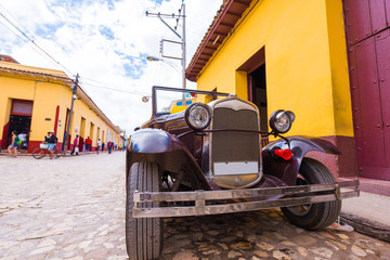 TRINIDAD, CUBA - MAY 16, 2017: American retro car on a city street. Close-up.