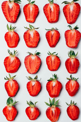 seamless pattern made of ripe fresh sliced strawberries on white