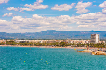 Fototapeta premium SALOU, SPAIN - JUNE 6, 2017: Coastline Costa Dorada, main beach in Salou, Tarragona, Catalunya, Spain. Copy space for text.
