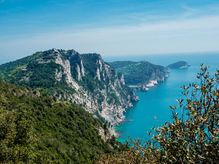 Fototapeta premium A view along the cliffs past Portovenere to Palmaria, Tino and Tinetto