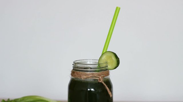 The concept of diet, detox, vegetarianism and a healthy lifestyle. Vegetable smoothies green