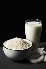rice, coconut and a glass of rice and coconut milk