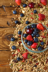 Muesli with strawberries and blueberries