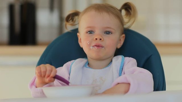 little baby girl eating