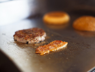 Meat and bacon for burger, indoor, fastfood making