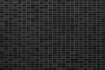 Fototapeta premium Black mosiac tile wall background
