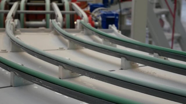 Factory for the Production of Ceramic Modern Tiles on Conveyor Belt. Conveyor Line With Ceramic Tile At Modern Heavy Plant