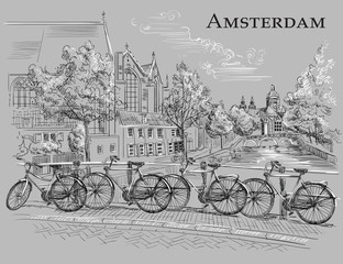 Bicycles on bridge in Amsterdam, grey