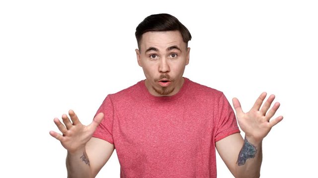 Portrait of confident man having beard and mustache shaking finger in denial and being definitely disagree, isolated over white background in studio closeup. Concept of emotions