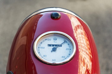 Detail of red vintage motorcycle Jawa 125 produced in former Czechoslovakia