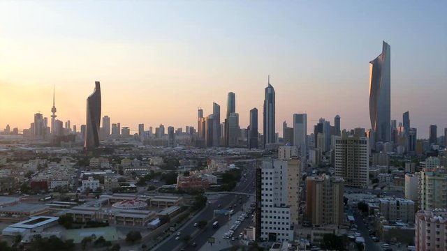 Kuwait, Kuwait City, elevated view over the modern city skyline at dusk