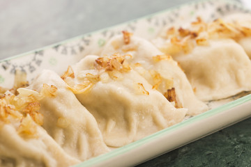 Polish pierogi filled with cabbage and mushrooms