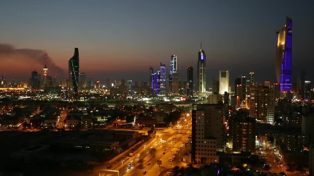 Kuwait, Kuwait City, elevated view over the modern city skyline at dusk