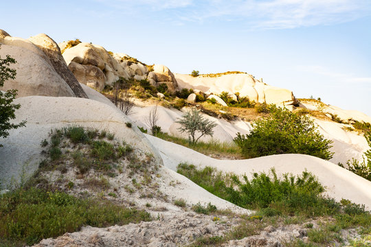 rock slopes on the edge of garden in Uchisar
