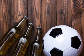 Top view of fresh beer with soccer ball. Beer Football