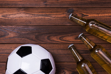 Top view of fresh beer with soccer ball. Beer Football