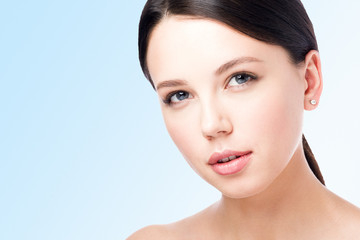 Obraz premium Сloseup the face of a beautiful young woman. Perfect beauty portrait
