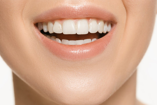 Beautiful and healthy woman smile, close-up