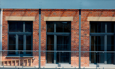 Balcony of loft building in the city. Made in old factory. Outdoor