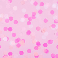 Creative pastel fantasy holiday card with pink party confetti. Baby shower, birthday, celebration concept.